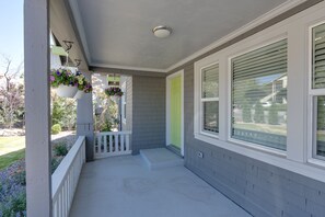 Step up to the entrance of this charming home, where a cozy porch awaits with a beautiful view.
