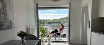 Close to the city center, with balcony, parking space and charging station