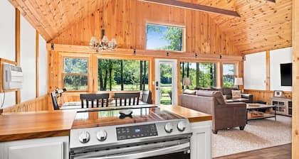 Secluded 4-season cabin w/private waterfront, epic game room & mins from trails