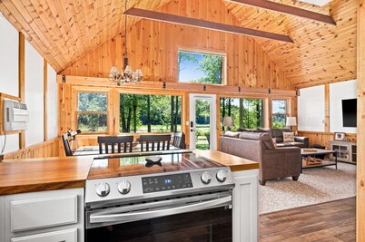 Secluded 4-season cabin w/private waterfront, epic game room & mins from trails