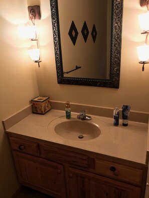 Combined shower/bathtub, hair dryer, towels, soap