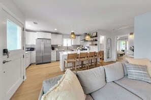 Smart TV, fireplace, books, printers
