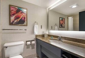 Combined shower/tub, hair dryer, towels, soap