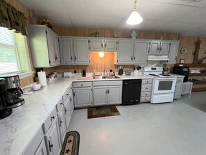 Fridge, microwave, oven, stovetop - Castaway Camp                   . (Many)