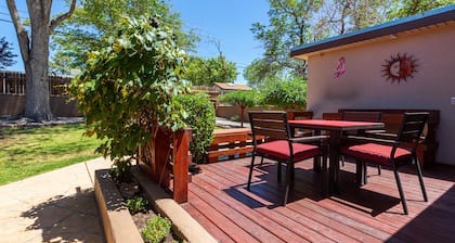 Desert Oasis with a deck and private backyard