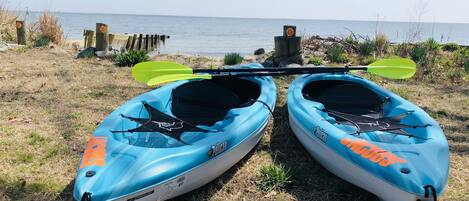 On the beach, sun-loungers