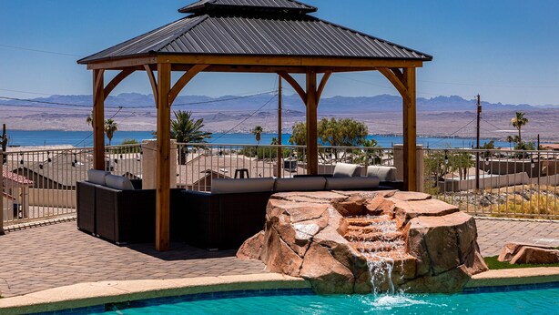 A gazebo with a view of a pool and mountains. - Luxury Lake View Villa with  Pool, Spa, Sleeps 14, Boat parking (Lake Havasu City)