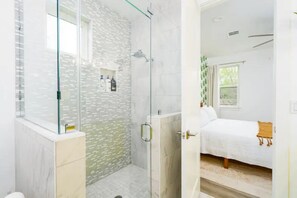 Combined shower/tub, hair dryer, towels, soap
