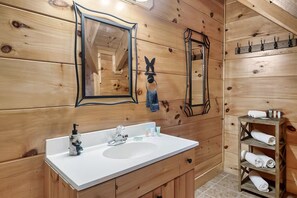 Combined shower/tub, hair dryer, towels, soap