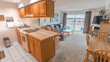 Condo, 1 King Bed with Sofa bed (Waters Edge 412) | Private kitchen