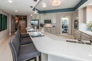 Fridge, microwave, oven, stovetop - Unobstructed Sunsets & Gulf Front Million Dollar Views at the Luxurious DaVinci~ Pet Friendly!~ DV202 (Indian Rocks Beach)