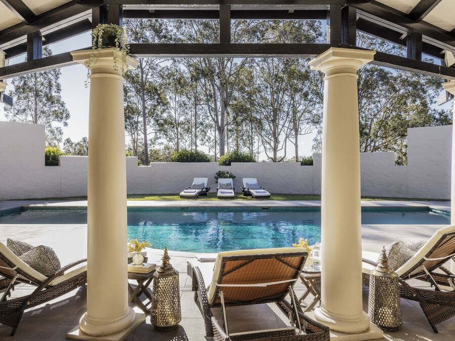 Outdoor pool, open 7:00 AM to 9:00 PM, pool loungers