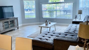 Family Apartment | Living area | 42-inch Smart TV with digital channels, TV