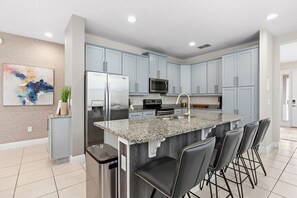 Fridge, microwave, oven, stovetop - Dog-friendly getaway with private pool + spa, putting green, patio, & game room (Kissimmee)