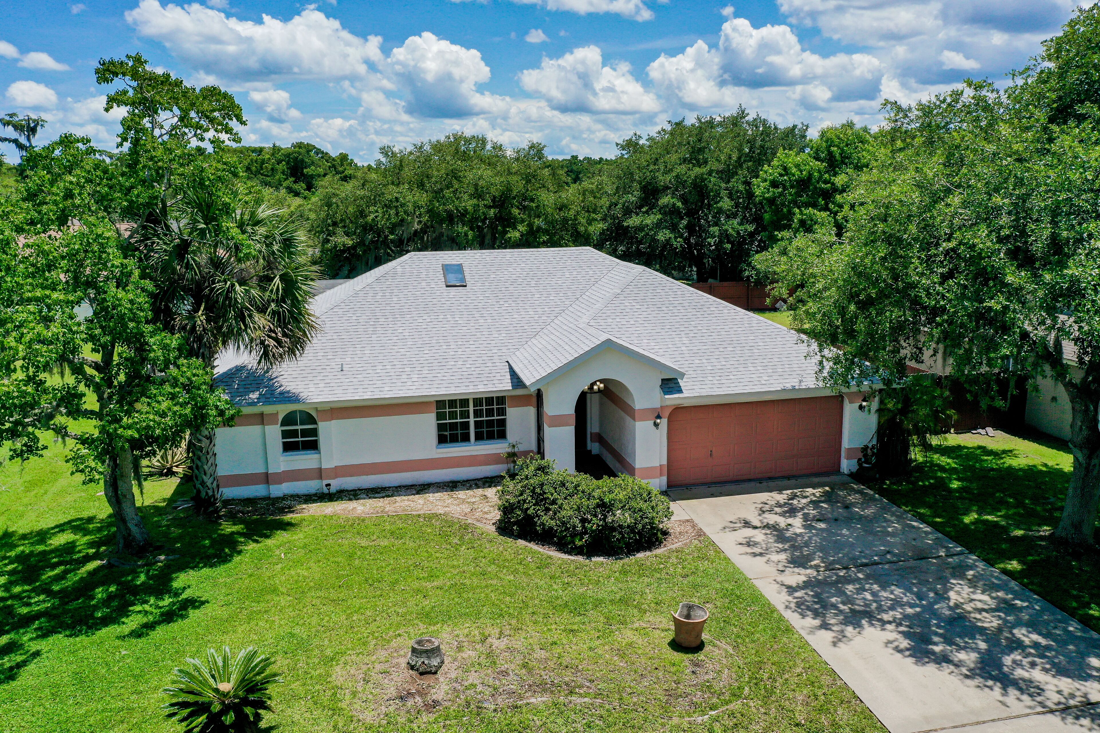 Quiet home with enclosed yard, heated pool with jets, & screened lanai