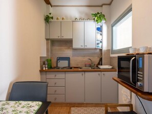 Fridge, microwave, cookware/dishes/utensils