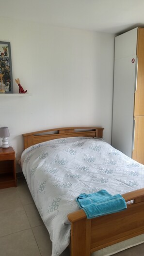 1 bedroom, desk, iron/ironing board, travel crib