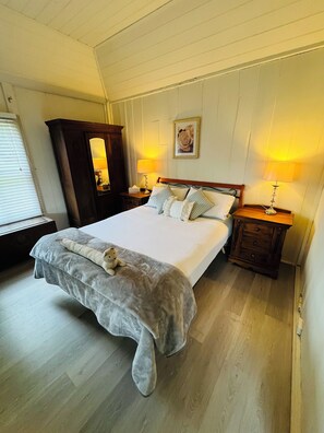 1 bedroom, desk, iron/ironing board, bed sheets