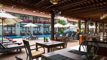 2 outdoor pools, pool umbrellas, pool loungers