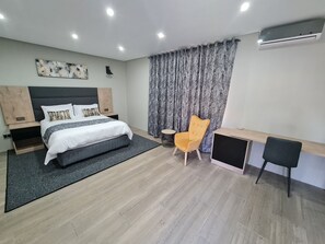 Habitació doble Deluxe | Caixa forta a l'habitació, planxa i posts de planxar i wifi gratuïta 