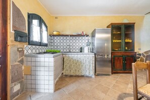 Fridge, stovetop, coffee/tea maker, cookware/dishes/utensils