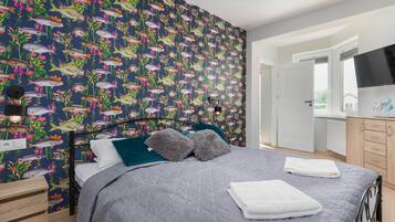 2 slaapkamers, een bureau, een strijkplank/strijkijzer, wifi