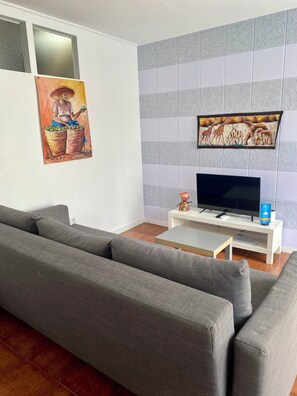 Apartment, 1 Double Bed with Sofa bed, Poolside | Living area | TV - Live Laugh Love Beach Guest Home with AC (Vila Nova de Gaia)
