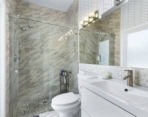 Bathtub, hair dryer, towels, soap
