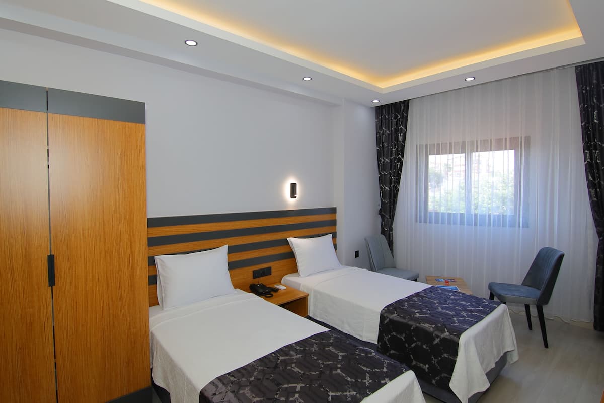 Quarto econômico | 1 quarto, frigobar (abastecido com itens grátis), cofres nos quartos