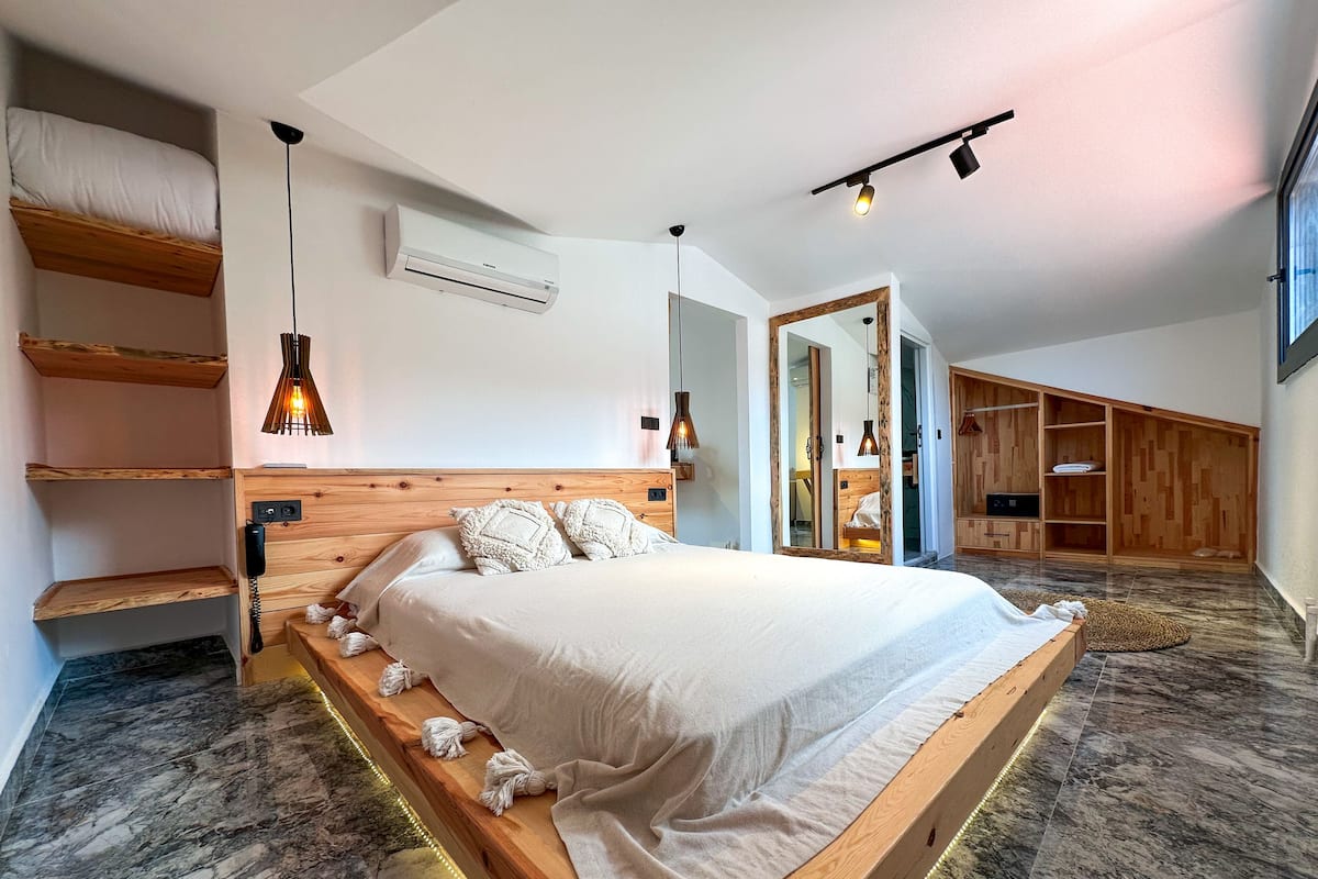 Suíte premium | 1 quarto, frigobar (abastecido com itens grátis), cofres nos quartos