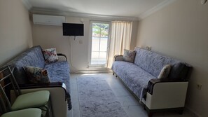 Standard Loft, Terrace, City View | Living area | TV - Sidelya Apart (Gökçeada)