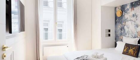 2 habitaciones, tabla de planchar con plancha, cuna de viaje y wifi