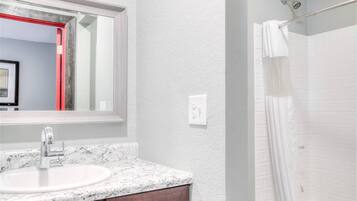 Bathtub, hair dryer, towels