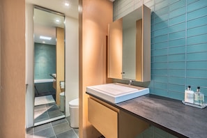 Bathtub, hair dryer, towels