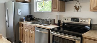 Farmhouse centered in  Petoskey Wine Region