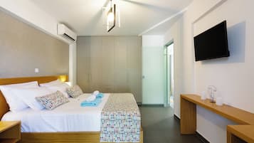 Apartment, 1 Bedroom, Pool View | Pillowtop beds, in-room safe, desk, laptop workspace