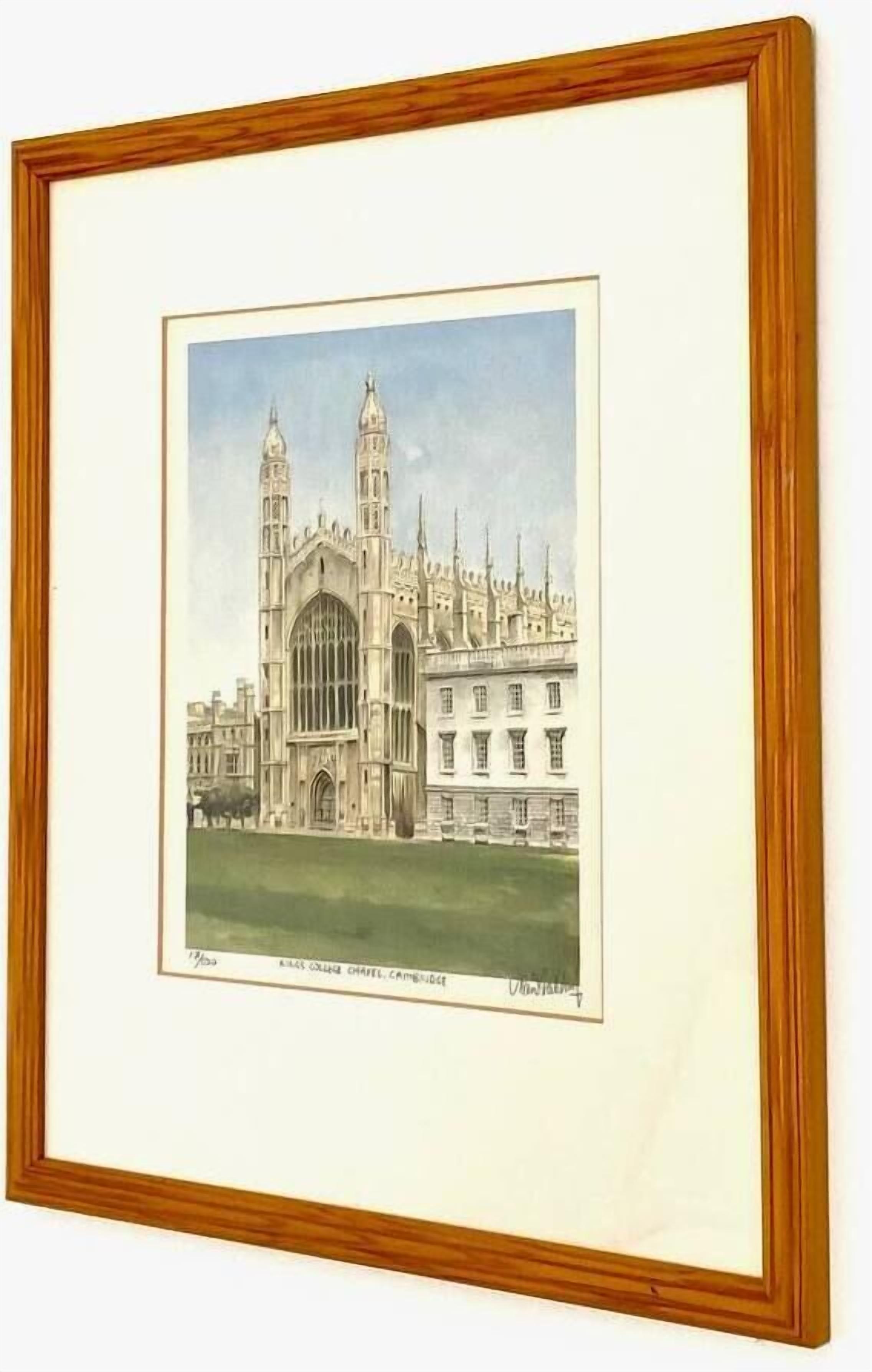 A framed architectural drawing of a large, historic building with two prominent towers and a central entrance.
