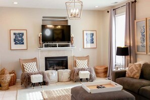 TV, fireplace, books, offices