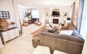 TV, fireplace, books, offices
