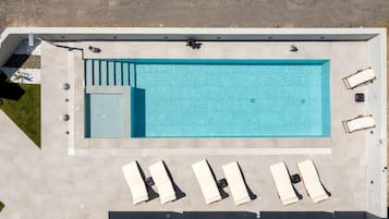 Outdoor pool, open 8:00 AM to 9:00 PM, pool umbrellas, sun loungers