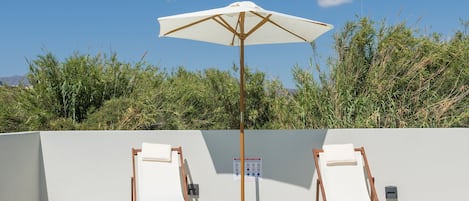 Outdoor pool, open 8:00 AM to 9:00 PM, pool umbrellas, sun loungers