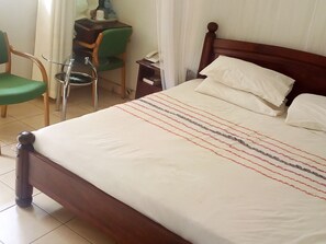 Desk, laptop workspace, free WiFi, bed sheets