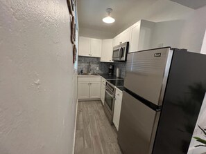 Villa, 1 King Bed | Private kitchen | Fridge, microwave, oven, stovetop