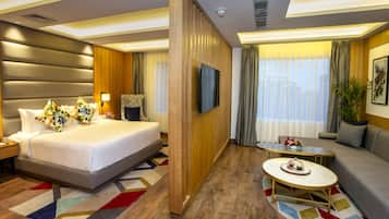 Suite, 1 King Bed, Non Smoking | Premium bedding, Select Comfort beds, free minibar, in-room safe