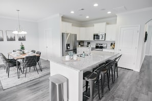 Fridge, microwave, oven, stovetop - Lavish 4BR/3BA Home with Pool, Grill, Video Games, King Bed (Lexington)