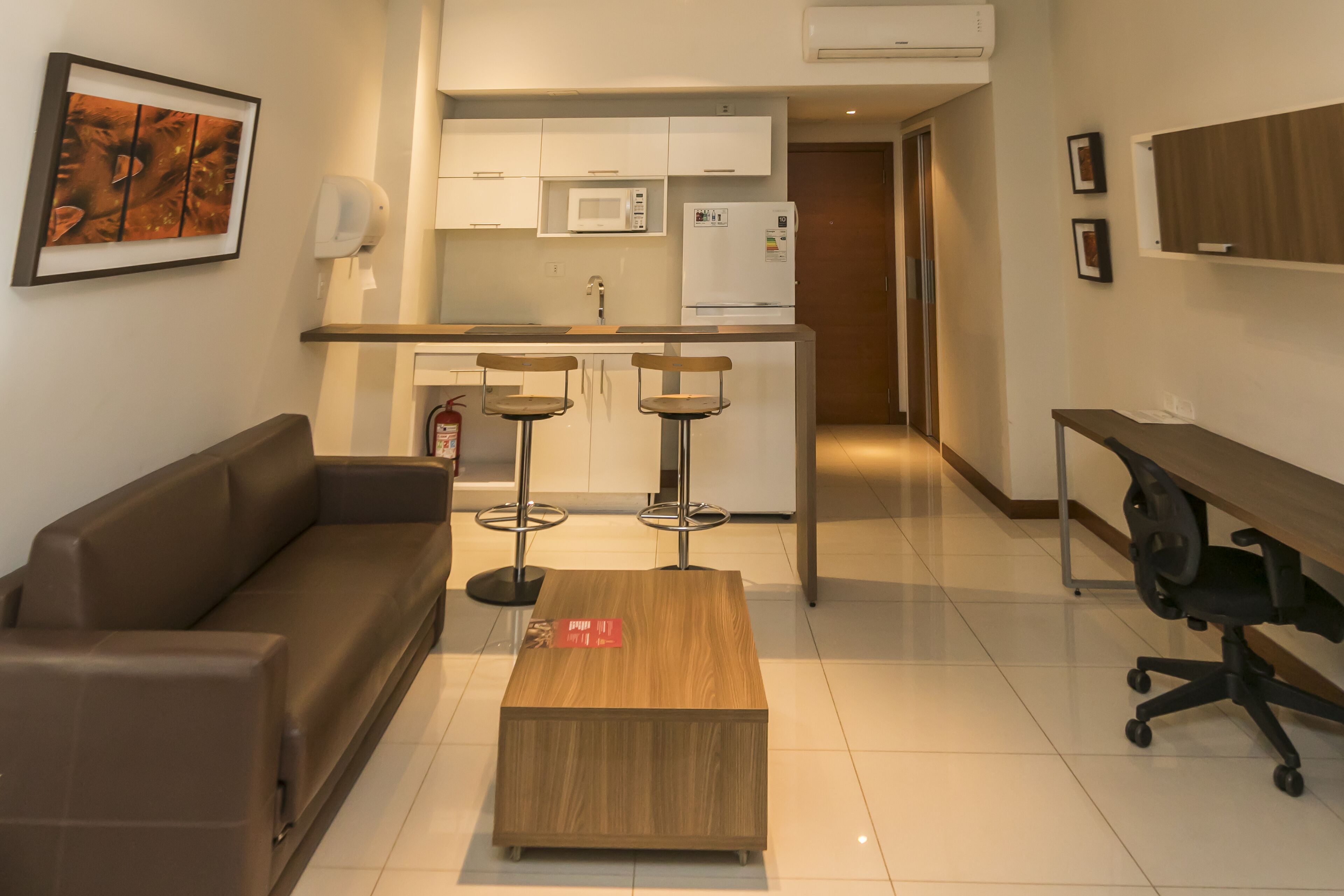 traditional studio | living area | 42-inch flat-screen tv with cable channels, tv