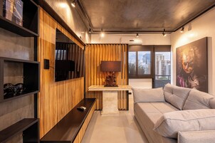 Deluxe Apartment | Living area | 40-inch Smart TV with digital channels, TV, Netflix