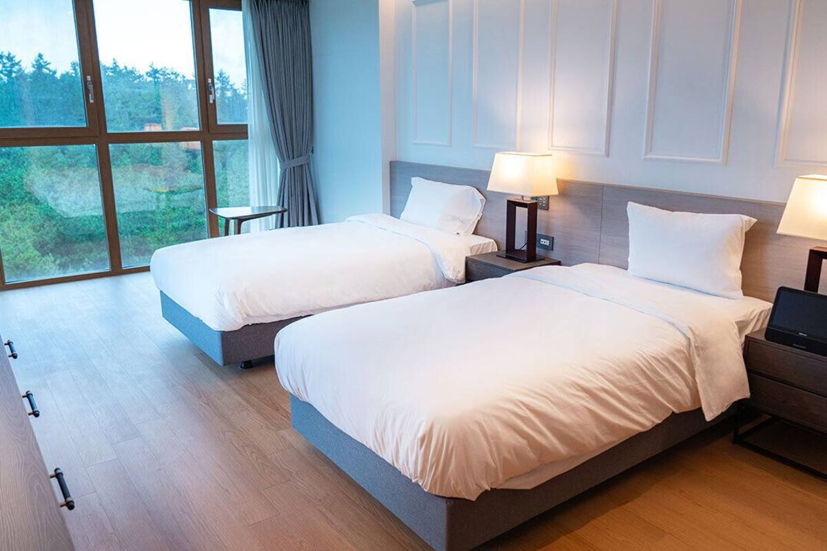 Deluxe Triple | Caja fuerte, wifi gratis, ropa de cama