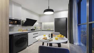 Espresso maker, coffee/tea maker, electric kettle, dining tables