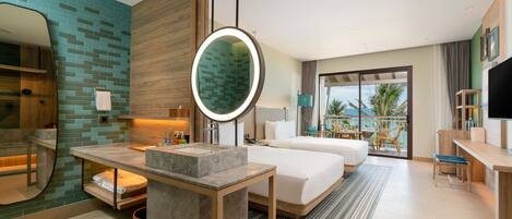 A modern hotel room with a large bed, a bathroom with a mirror and sink, a balcony with a view, and a TV.